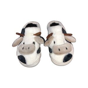 Black and white cow slippers, size 10.